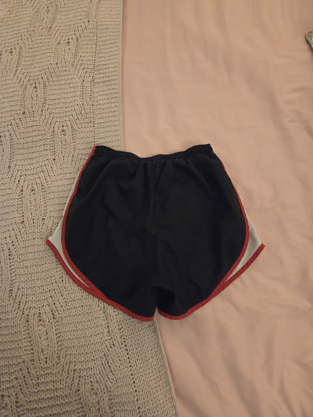 Nike Black Women's Running Shorts with Red Trim and White Side Panels